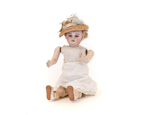 Circa 1880s French Jules Steiner Mechanical Doll with gilt coloured key to the left side, when wound causes the doll to kick 