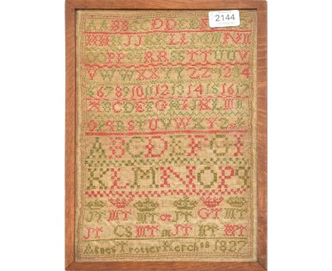 Alphabet Sampler Worked by Agnes Trotter Kerch Dated 1827, worked in red and green threads in a band format, framed 25cm by 3