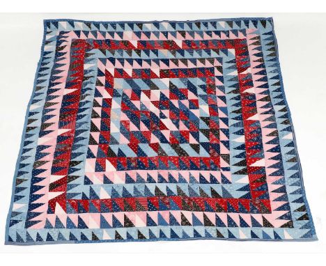 Late 19th/Early 20th Century Saw Tooth Patchwork Cover, worked in frames with blue, red and pink sprigged cotton fabrics with