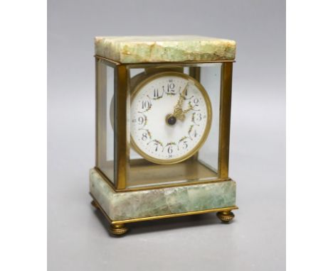 A French onyx and brass small mantel clock, with ornate enamel dial,14.5cms high