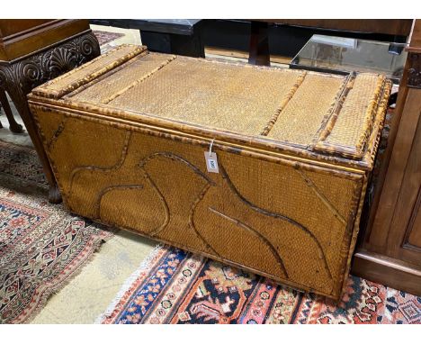 An early 20th century bamboo and rattan trunk, width 110cm, depth 52cm, height 56cm
