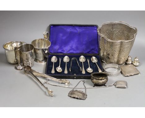 A Siamese sterling two handled ice pail with tongs, height 12.5cm, together with a cased set of six teaspoons with tongs, a s