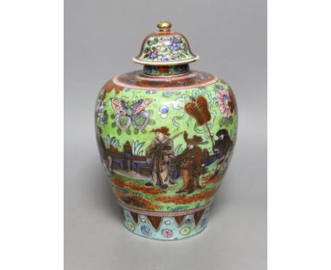 A clobbered Delft vase with a clobbered Chinese porcelain cover, 24cm high