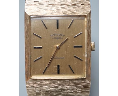 A gentleman's early 1970's textured 9ct gold Rotary manual wind dress wrist watch, with baton numerals, gross weight 67 grams