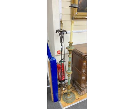 A Victorian style green painted parcel gilt lamp standard together with a wrought iron standard lamp, larger height 156cm