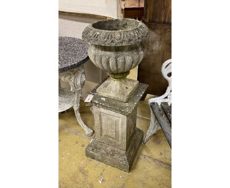 A circular reconstituted stone campana garden urn on square pedestal, height 95cm