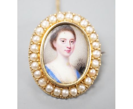 Attributed to Nathaniel Hone (1718-1784) a portrait miniature brooch, the 18th century inset enamel on copper portrait of a y