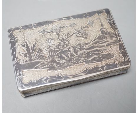A late 19th century Russian 84 zolotnik and niello snuff box, decorate with figures in a landscape, 85mm.