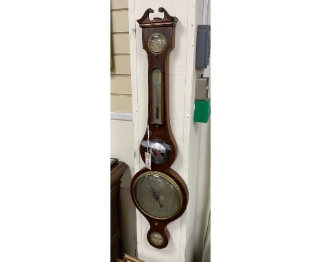 An early 19th century mahogany wheel barometer, height 98cm