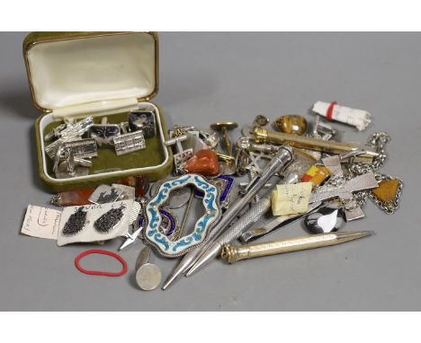 A group of mixed items including quartz pendants, a sterling and enamel brooch, 68mm, assorted pairs of cufflinks, medallions