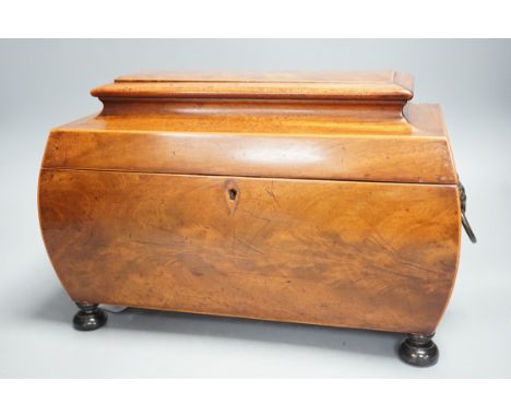 A  George IV mahogany bombe-shaped sarcophagus tea caddy, 33cms wide