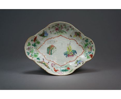 A Chinese famille rose pedestal dish 19th Century Of lobed oval form raised on a conforming base, painted in colours with Sho