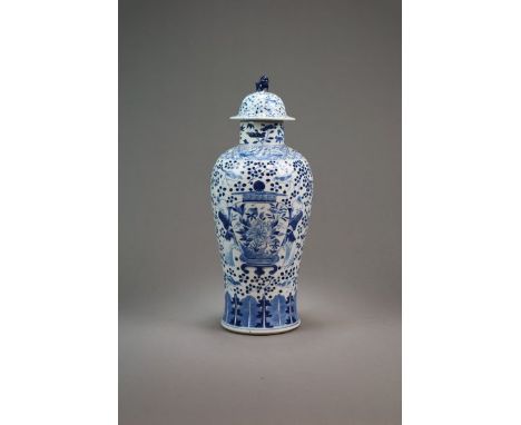 A Chinese blue and white vase and cover 19th Century Of baluster form, the domed cover with lion finial, decorated with Confu