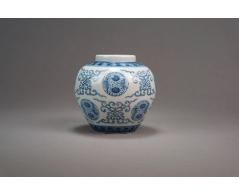 A Chinese blue and white jar Qianlong seal mark and possibly period Of ovoid shape and decorated with repeating sunflower bos