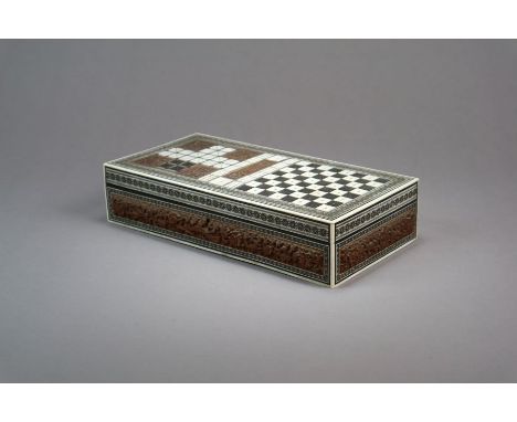 An Indian inlaid mixed wood and sadeli work games box 19th Century Of rectangular form with hinged cover, the top inlaid with