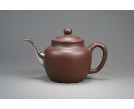 A Chinese Yixing teapot and cover 18th/19th Century Of ovoid form, the slightly domed cover with compressed globular finial, 