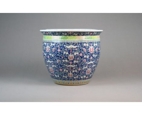 A Chinese famille rose jardiniere Late Qing Dynasty Of fish bowl form with heavy everted rim, decorated with a formal 'brocad