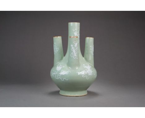 A rare Chinese celadon five-spouted vase Daoguang seal mark and of the period The elegant globular body rising to four cylind