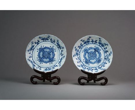 A pair of Chinese blue and white lotus dishes Chenghua six-character marks but probably Kangxi Of gently lobed form and decor