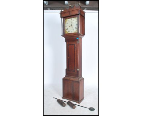 A 19th century Georgian painted face longcase clock / grandfather clock with the dial marked for Ledbury. The oak case with c
