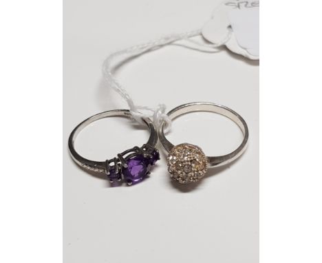 SILVER AMETHYST RING AND CZ CLUSTER RING SIZES R1/2 AND S1/2 GROSS WEIGHT 4.5G