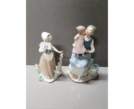 2 NAO BY LLADRO  FIGURINES INC GIRL WITH BUTTERFLY AND BUNDLE OF LOVE
