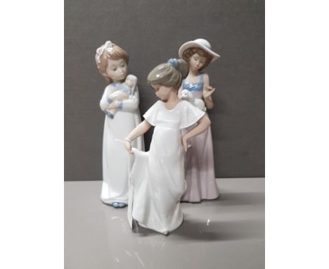 3 NAO FIGURES INC LADY HOLDING DOG ETC