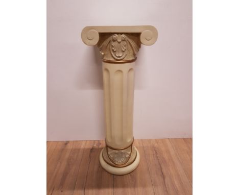 A PLANT STAND IN THE GREEK COLUMN DESIGN