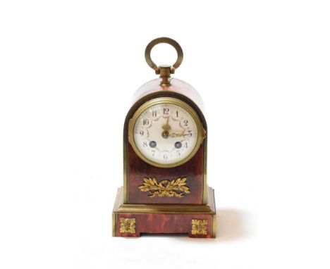 A 19th century French tortoiseshell and ormolu mounted mantel clock, twin train movement, Arabic dial, plinth base, 22cm high
