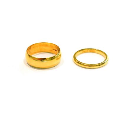 Two 18 carat gold band rings, finger sizes I and K1/2.  Gross weight 6.8 grams