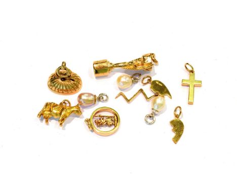 Three 18 carat white gold cultured pearl pendants; seven 9 carat gold pendants/charms including a cross, a cow, a lightning b