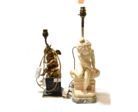 A gilt metal cherub table lamp, on a black slate plinth; together with a figural table lamp of a child seated on a wall, sign