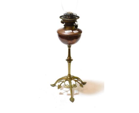 A Benson oil lamp with copper reservoir 