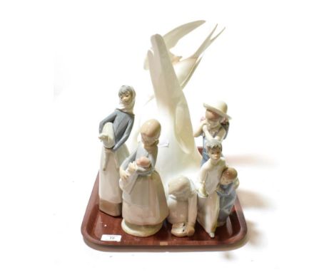 Four Lladro figures, one Nao figure, and a Royal Doulton Images model titled 'Courtship' HN3525 (6)