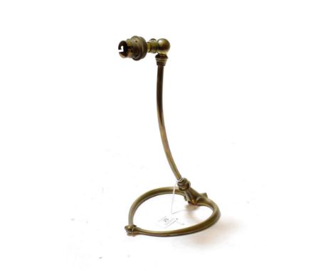 An Art Nouveau brass lamp with stylised heart shaped base, probably Benson
