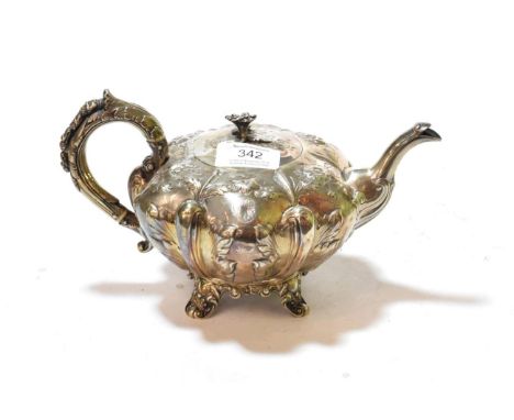 A Victorian silver teapot, the body by Benjamin Stephens, London, 1840, the handle by George and John Cowie, circa 1830, the 