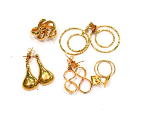 A pair of 9 carat gold stud earrings; three pairs of 9 carat gold drop earrings; and two further pairs of unmarked earrings .