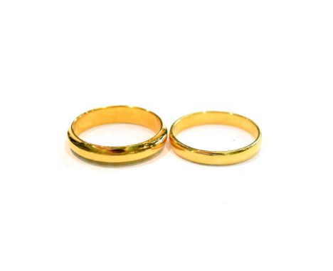 Two 18 carat gold band rings, finger sizes N and O (2) .  Gross weight 6.0 grams. 