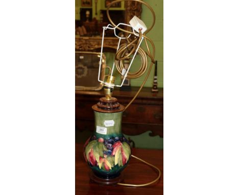 A Moorcroft pottery table lamp in the Leaf and Berries pattern, circa 1980s