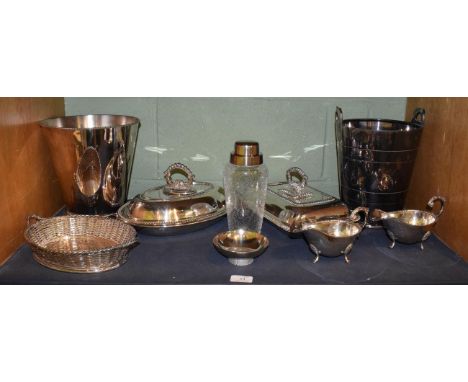 A group of assorted silver-plate items including: two differing tapering silver-plated wine-coolers; two differing silver-pla