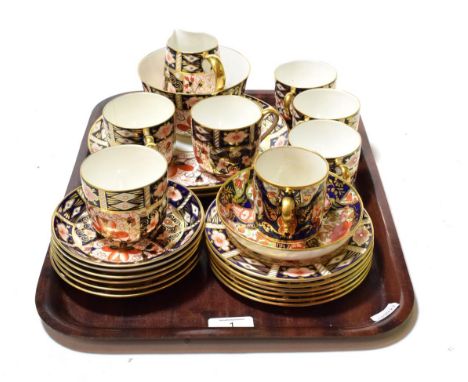 A quantity of Royal Crown Derby Imari wares including: coffee cans, saucers etc; together with a single Derby cup and saucer 