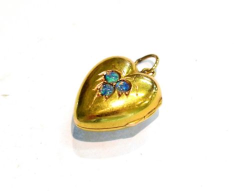 A 15 carat gold opal set heart locket, length 2.7cm .  Gross weight 3.2 grams. 