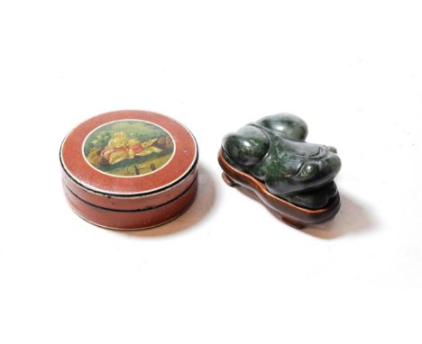 A Louis XVI Vernis Martin circular snuff box; and a stone toad on wood stand (2)