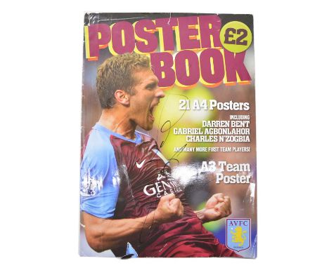 Signed Aston Villa official poster book, 2011/2012, including Stilian Petrov, Alan Hutton, Darren Bent, Charles N'Zogbia, Emi