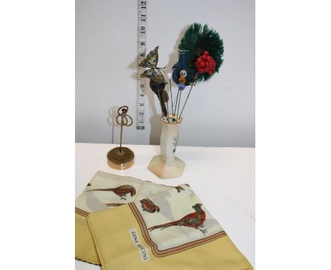 A selection of vintage hat pins and hat pin holders and scarf 