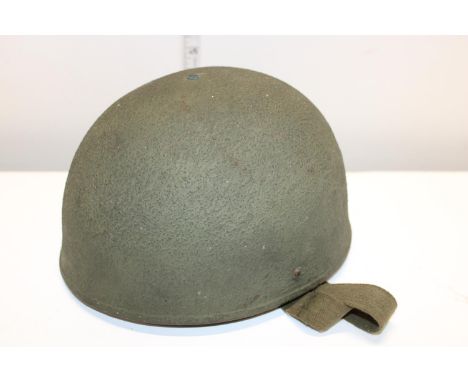 A 1955 REM M2 Military helmet 