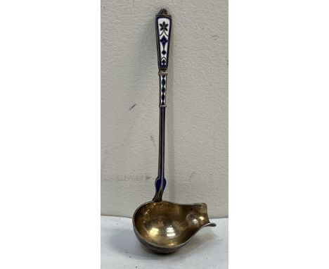 A Danish silver and enamel toddy ladle by Peter Hertz with gilt bowl. 5" long. 16dwts