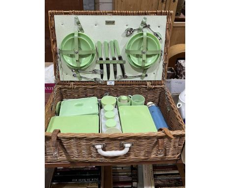 A 1950's Brexton wicker cased picnic set