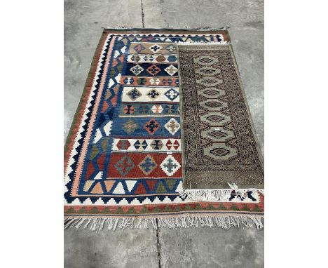 A Kilim carpet 90" x 58" and a carpet runner.