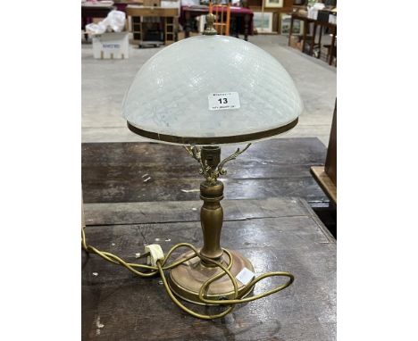 A brass table lamp with 'Vaseline' domed glass shade. 17" high